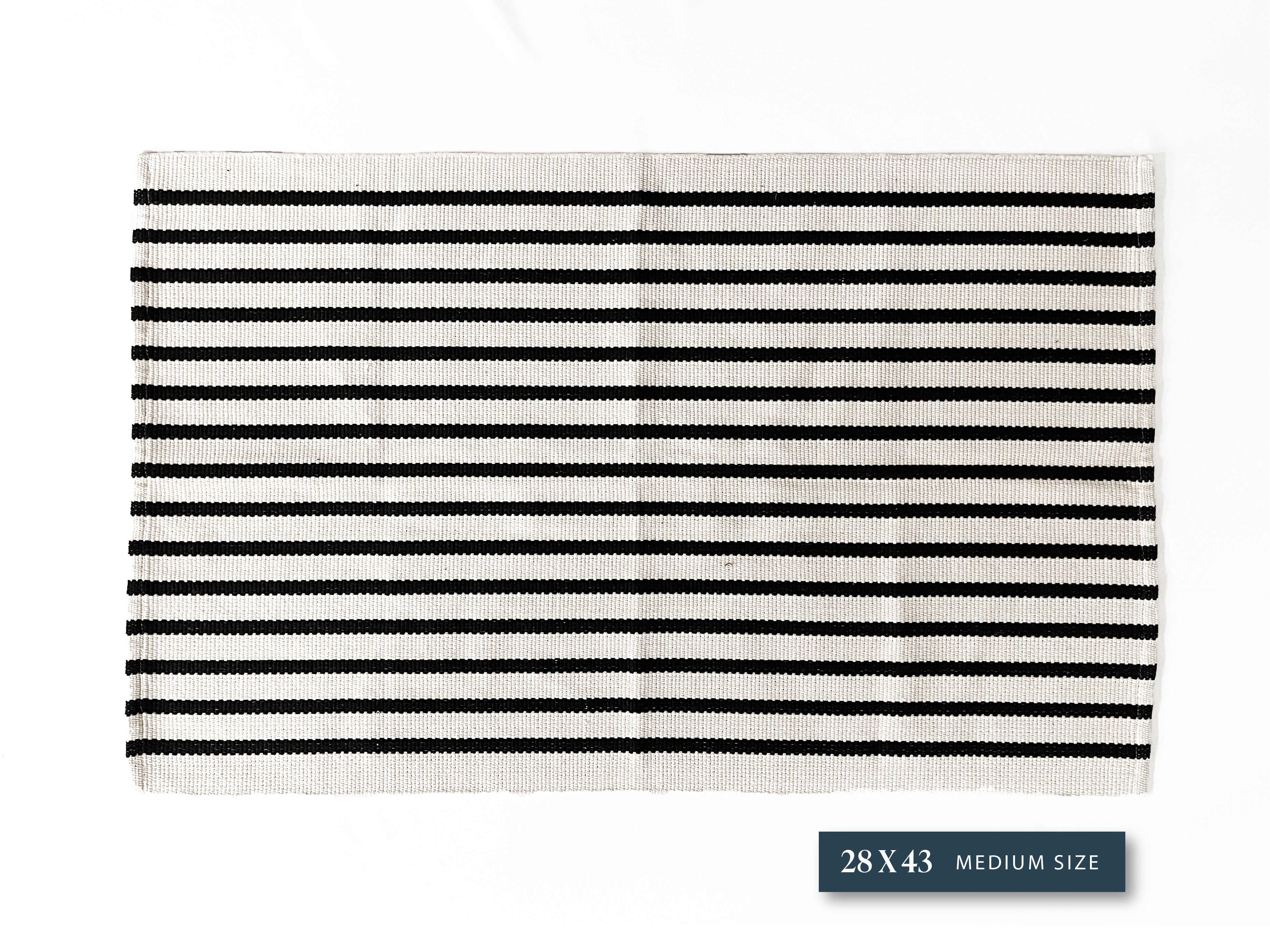 Cream and Black Thin Stripe Layering Rug