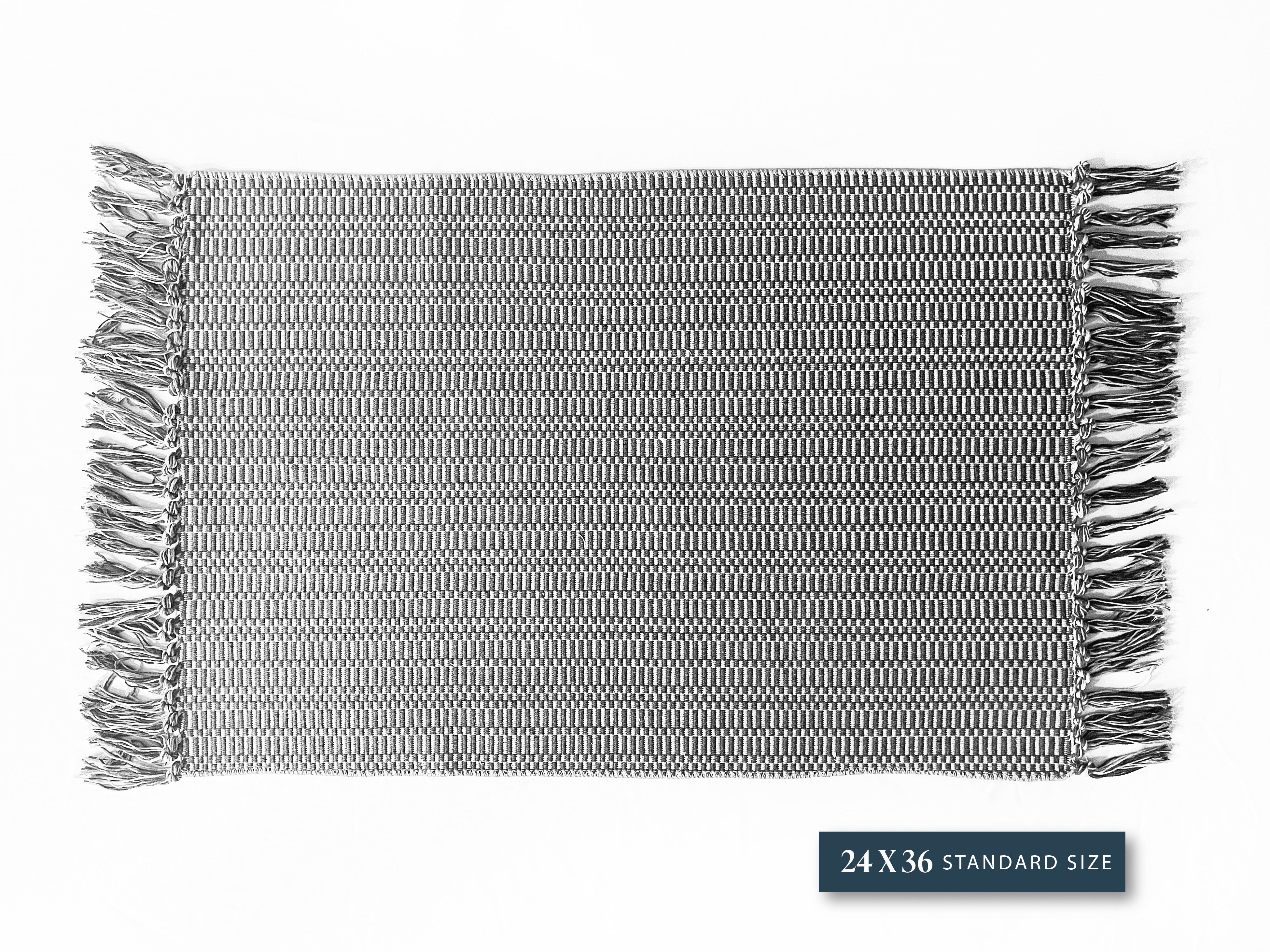 Grey Tassle Layering Rug